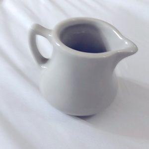 Vintage hall pottery mini creamer/syrup.